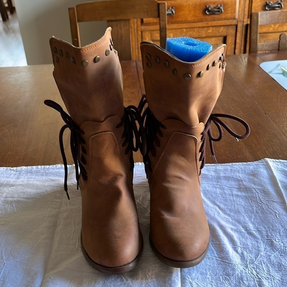 No Brand tan boots with ties on each side. Zipper in back. Size 7. New